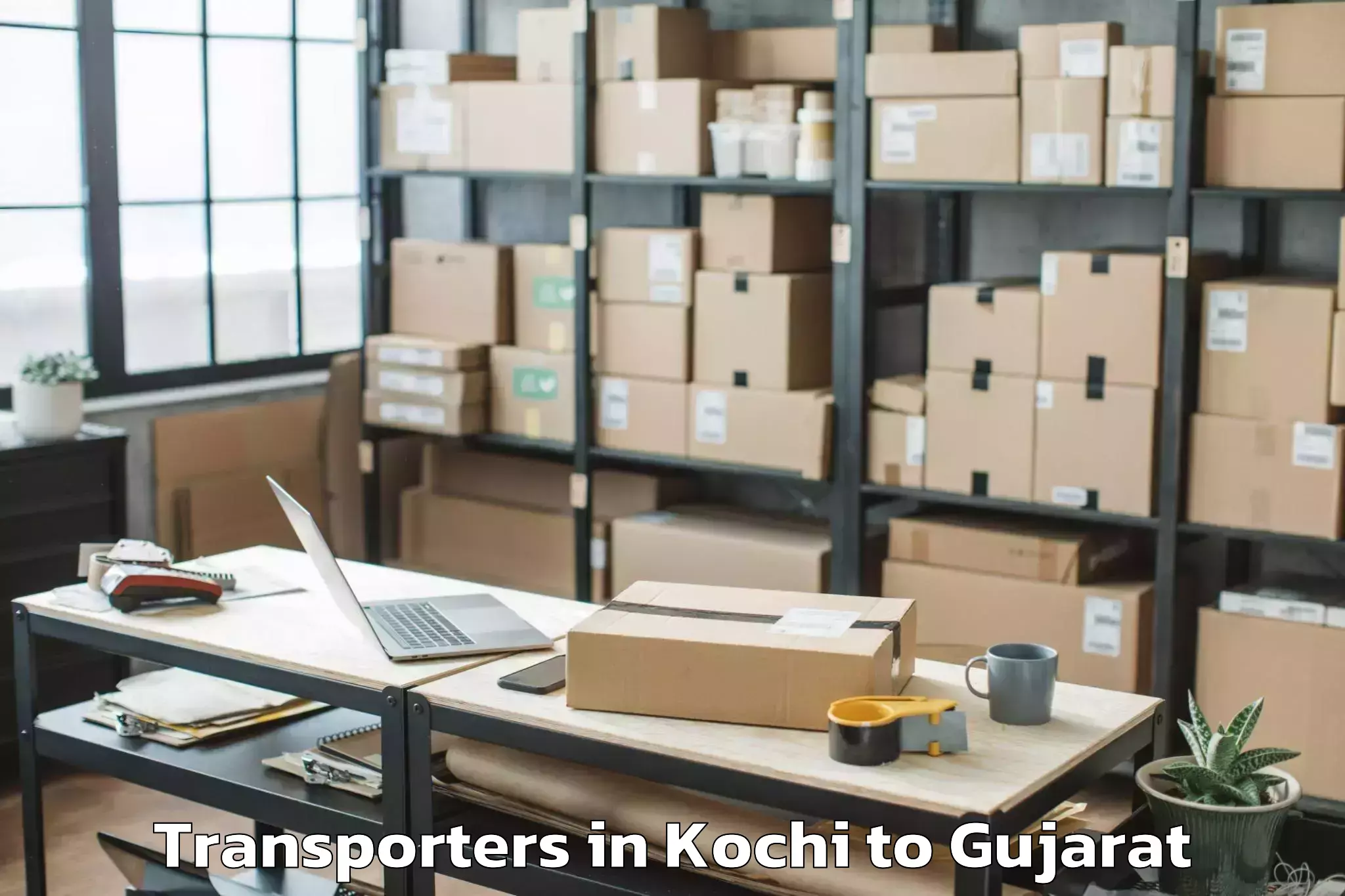 Hassle-Free Kochi to Gujarat National Law Universit Transporters